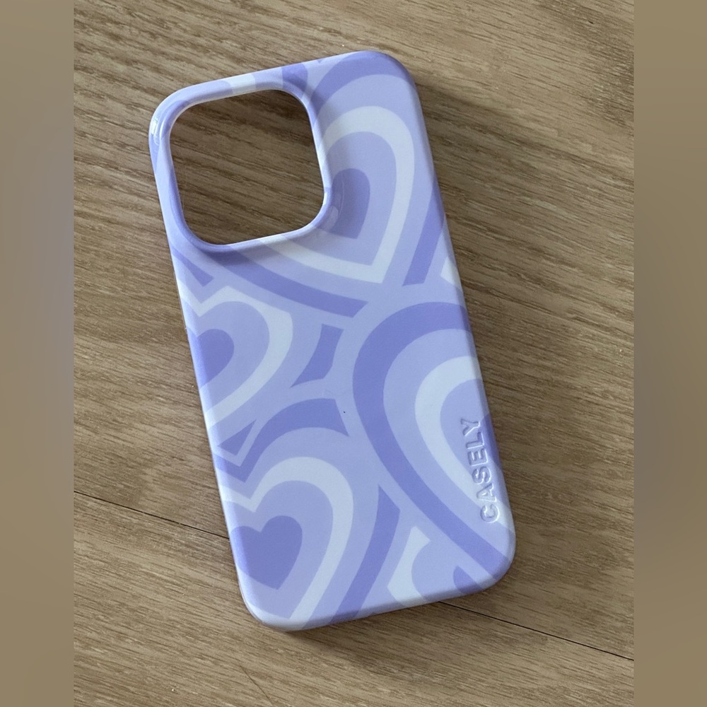 Casely Purple Heart Pattern IPhone 14 Pro Phone Case